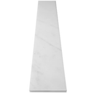 White marble stone wall cap with subtle gray veining, designed for shower walls, knee walls, pony walls, and architectural partitions.